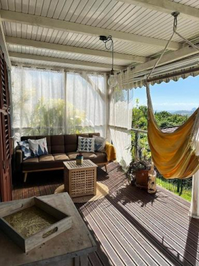 Bungalow vue mer avec jardin